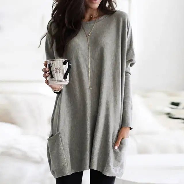 Versatile ladies' long sleeve tunic top, oversized design with convenient pockets for casual fashion.
