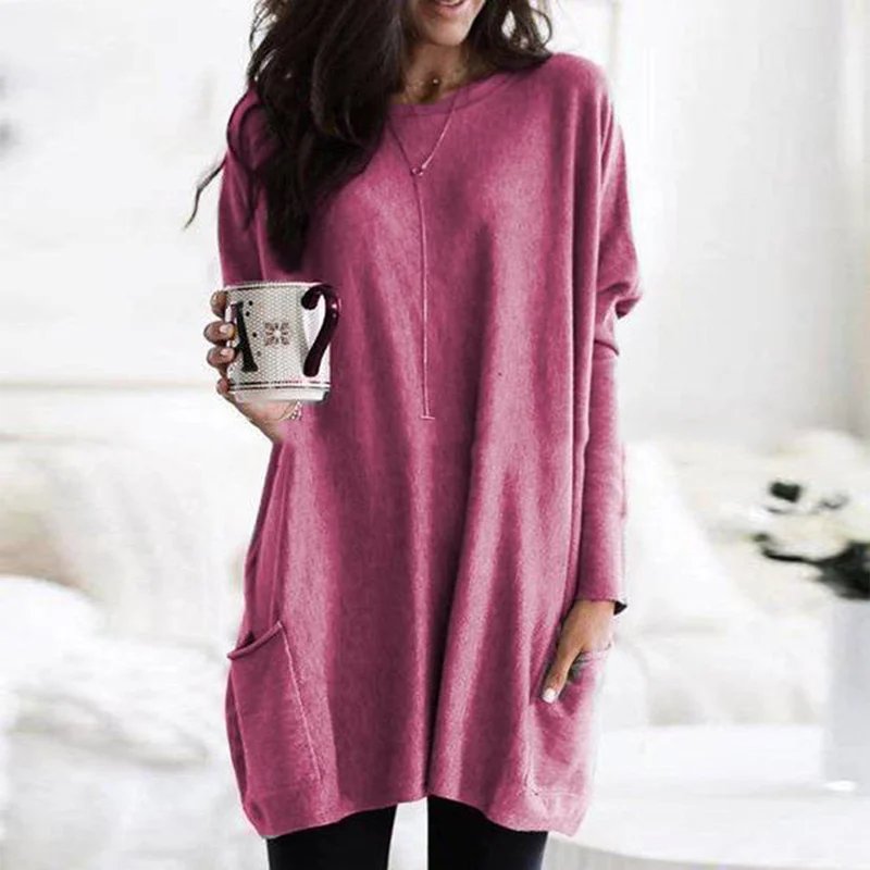 Relaxed fit women's oversized long sleeve tunic top, a comfortable piece with practical pockets.