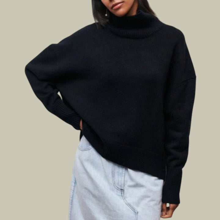 Close-up of a cozy knit women's oversized turtleneck, showcasing the soft texture