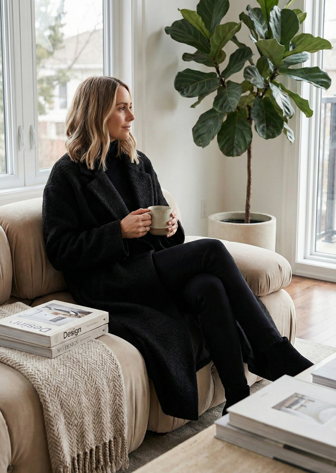Fashionable women's oversized maxi winter coat, providing a longline, relaxed fit. Stylish outerwear for warmth.