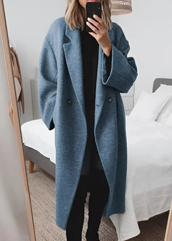 Front view of an elegant women's oversized maxi winter coat. Longline outerwear for warmth, perfect for chic winter fashion.