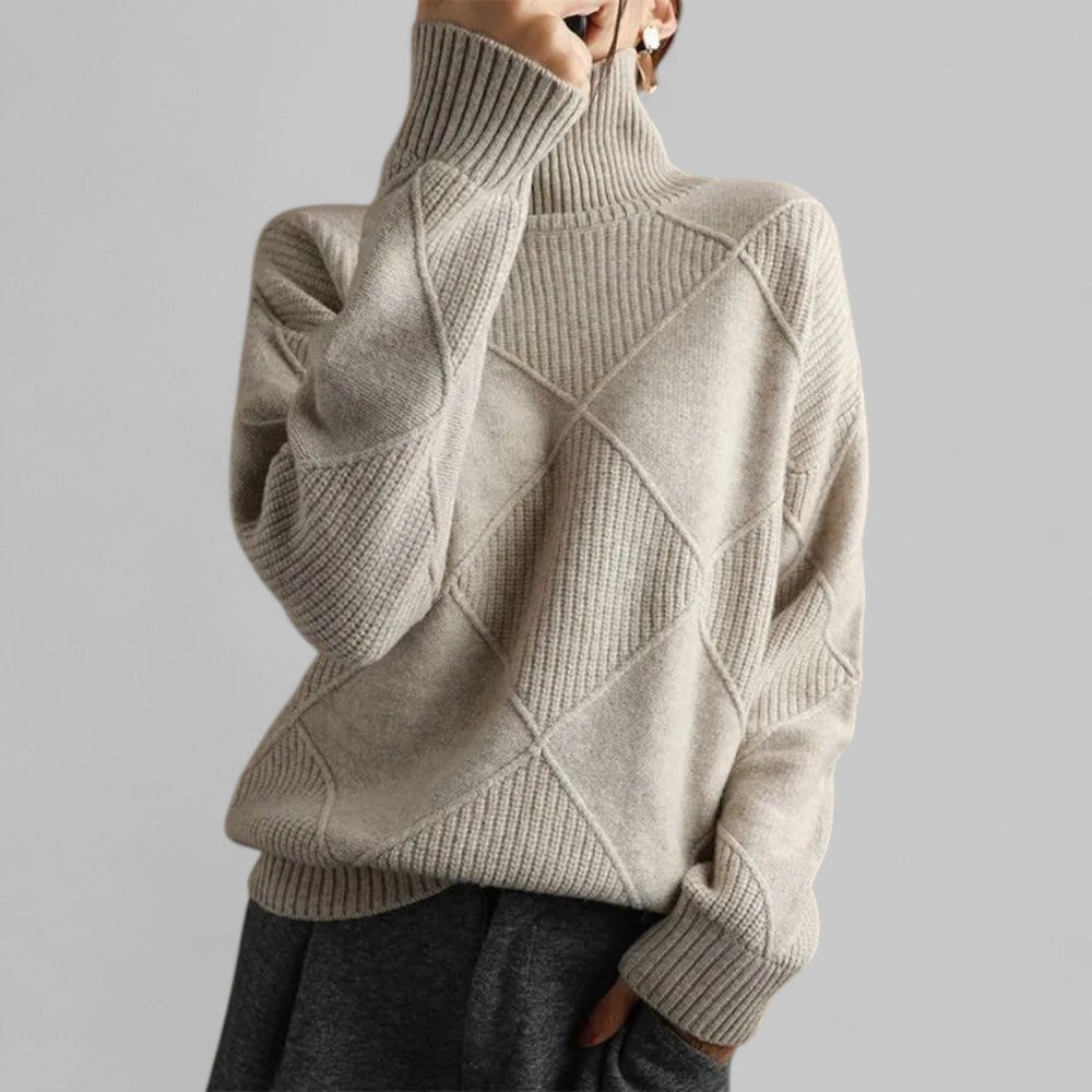 Cozy patterned oversized turtleneck sweater for women, made from soft, warm knitwear fabric.