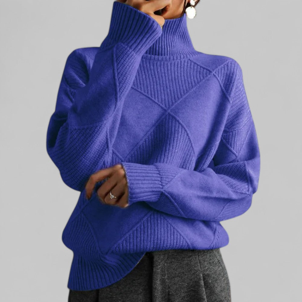 Chic women's oversized turtleneck sweater with an eye-catching pattern, perfect for chilly days.