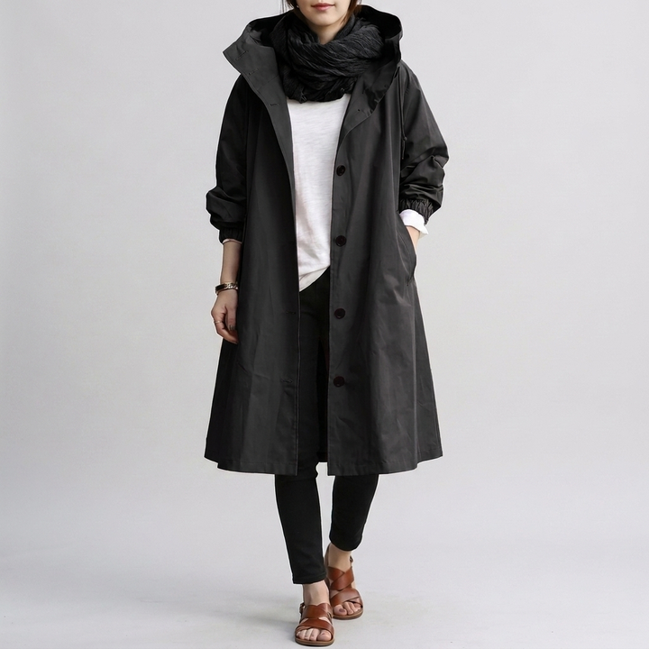 Fashionable autumn oversized rain jacket for women, offering chic & waterproof protection.