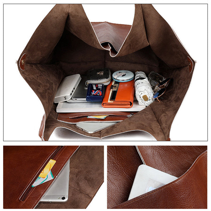 Sophisticated women's oversized vintage leather shoulder bag, a fashion statement.