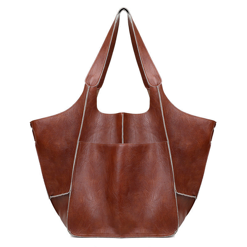 Modern women's oversized vintage leather shoulder bag, ideal for daily wear.