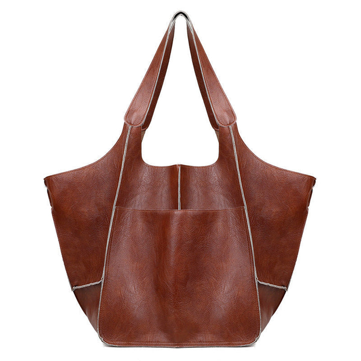 Modern women's oversized vintage leather shoulder bag, ideal for daily wear.