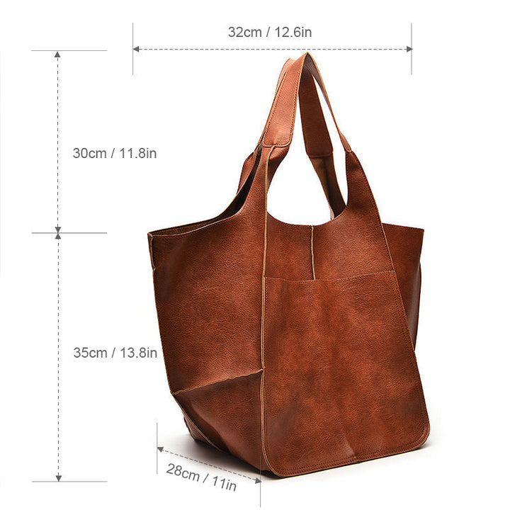 Luxurious women's oversized vintage leather shoulder bag, an elegant accessory.