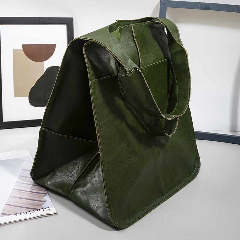 Classic women's vintage leather oversized tote, a timeless shoulder bag design.