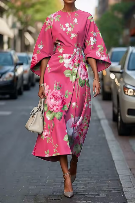Flowy A-line floral midi dress for women, with charming puff sleeves and a colorful painterly print for events.