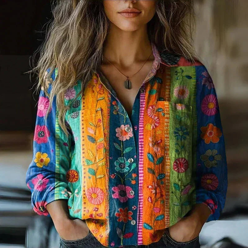 Women's western boho button-down long sleeve blouse. Features a stylish paisley bandana print & comfortable design.