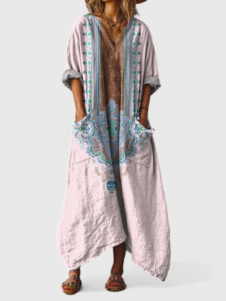 Women's oversized boho maxi dress. Paisley print, V-neck, relaxed fit, flowy, and comfortable summer casual wear.