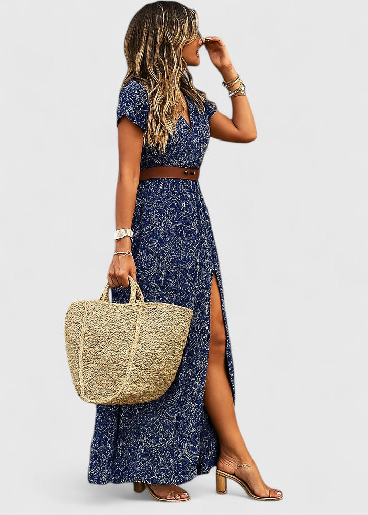 Women's paisley print maxi dress with V-neck, short sleeves, belted waist, and elegant side slit for boho style.