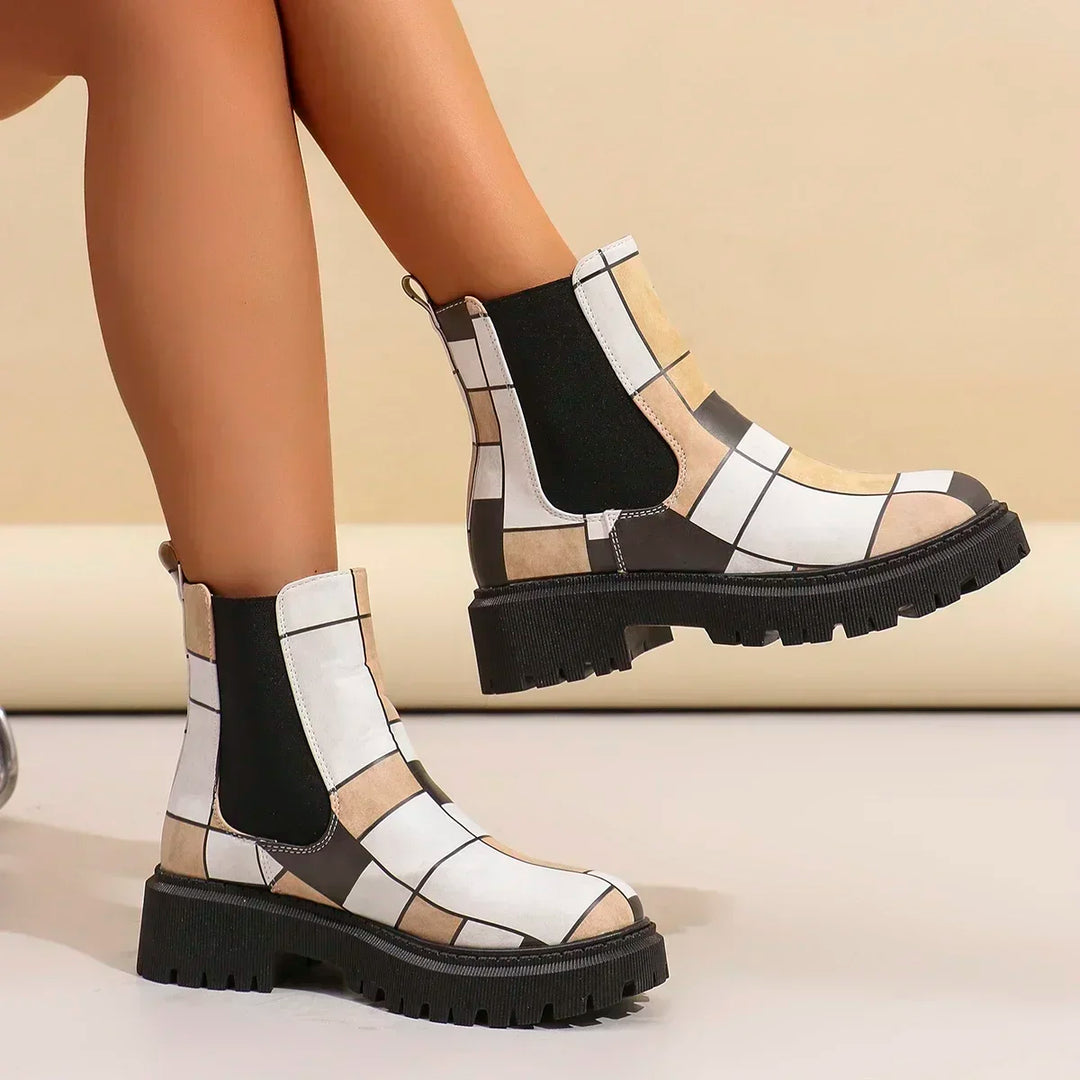 Orthopedic women's ankle boots in a modern patchwork style, suitable for comfortable everyday fashion.
