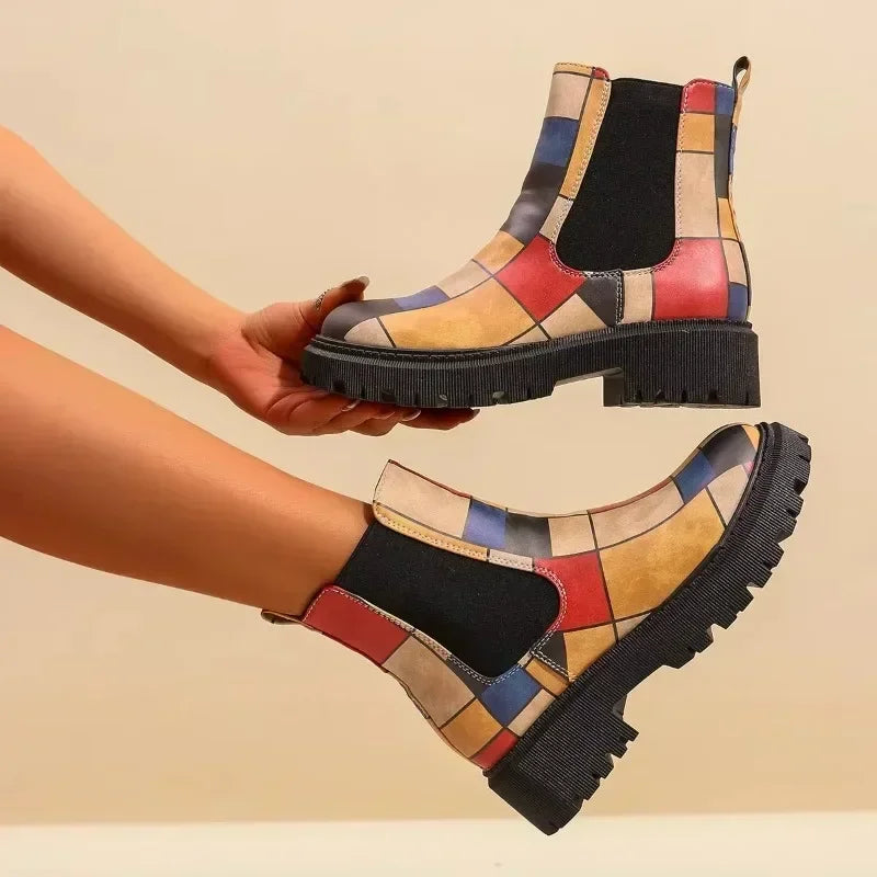 Detail shot of the lug sole on women's patchwork ankle boots, emphasizing grip and comfort.