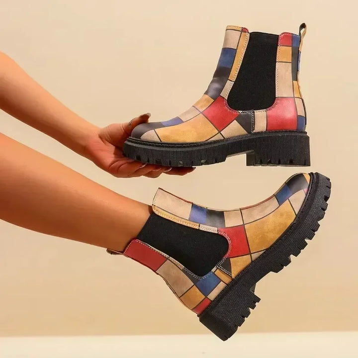 Detail shot of the lug sole on women's patchwork ankle boots, emphasizing grip and comfort.