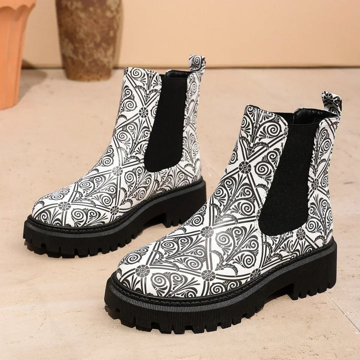 Women's ankle boots with geometric patchwork, offering orthopedic comfort and a fashionable look.