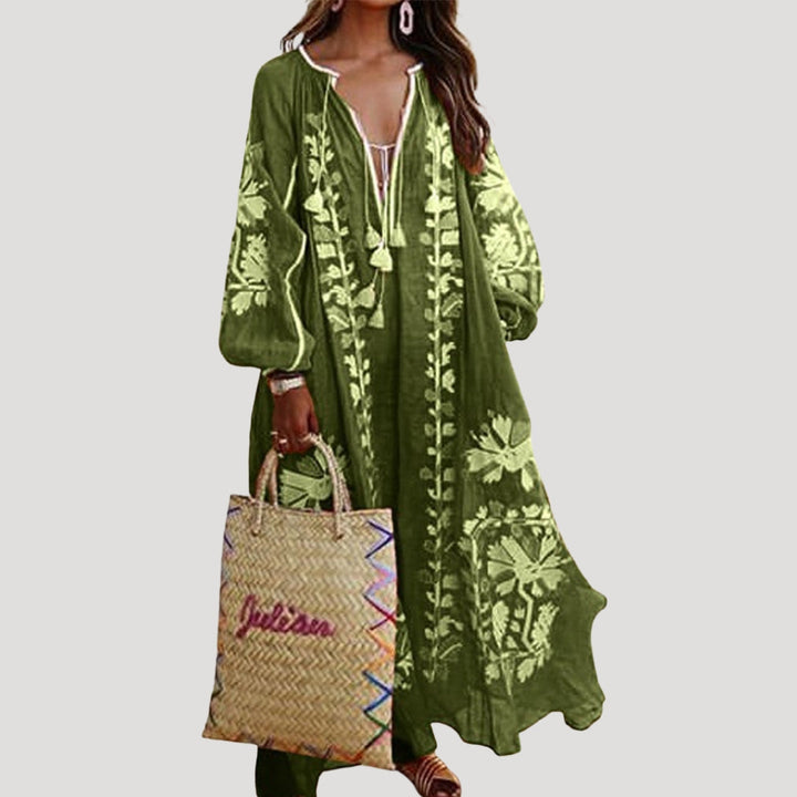 Relaxed fit women's patterned long sleeve V-neck maxi dress, offering a comfortable and chic everyday style.