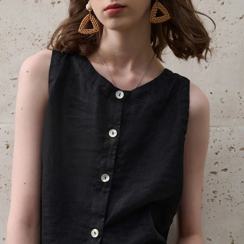 Versatile black asymmetric crop top for women with a crew neck and sleeveless design, everyday wear.