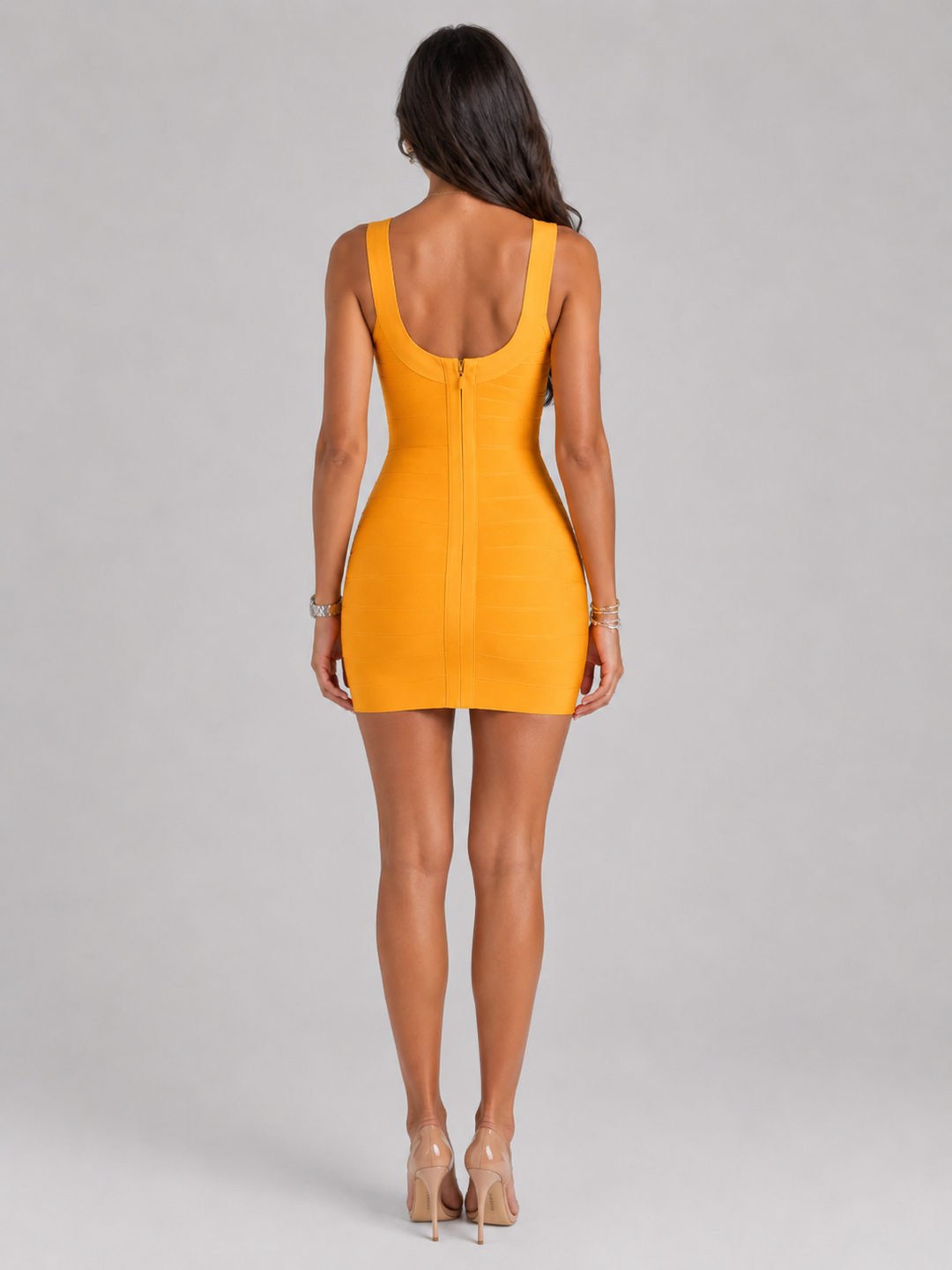 Fitted orange mini dress, square neck bandage design, ideal for homecoming events.