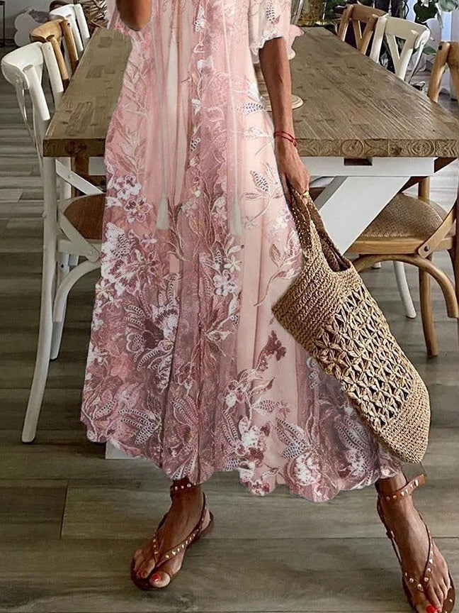 Flowy women's floral print V-neck maxi dress with half sleeves. Comfortable loose fit for everyday casual or beach wear.