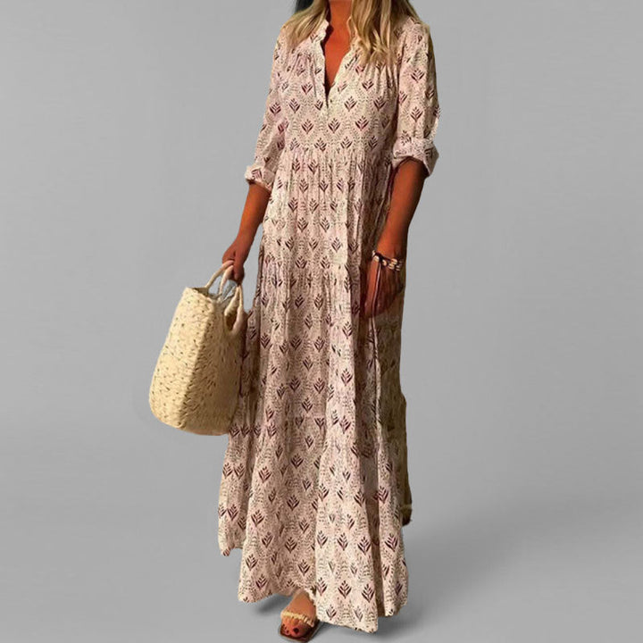 Women's pink flowing tiered maxi dress with V-neck, perfect for elegant summer and casual occasions. Modest fashion.