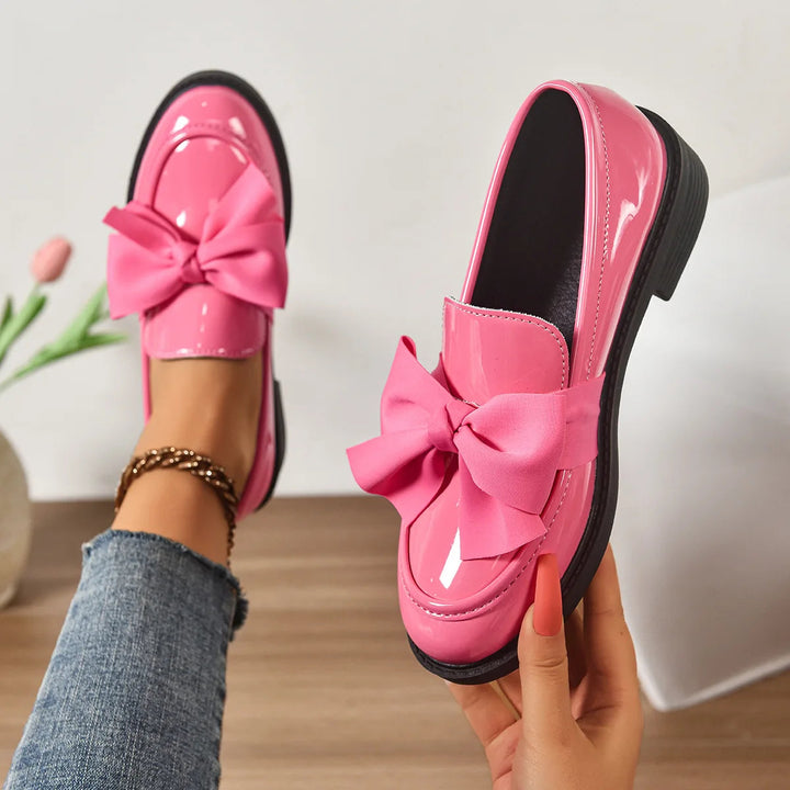 Women's pink orthopedic loafers with arch support & comfortable block heels, perfect for stylish workwear.