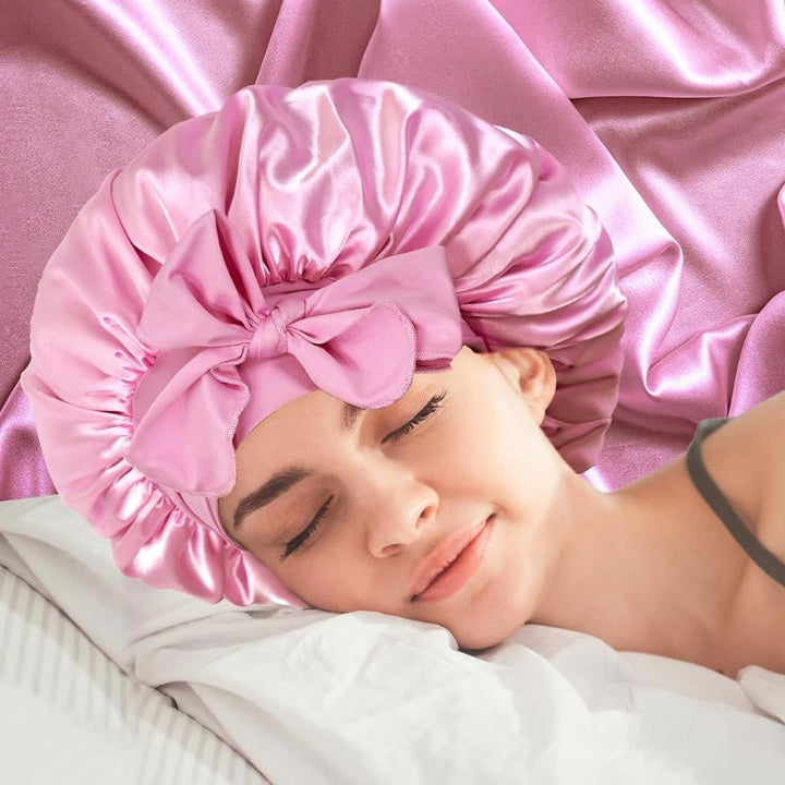 Women's anti-breakage sleepcap in fuchsia silk satin, adjustable for comfort