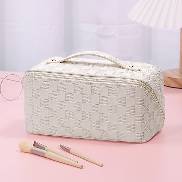 Women's waterproof plaid makeup organizer, combining style with practical travel features.