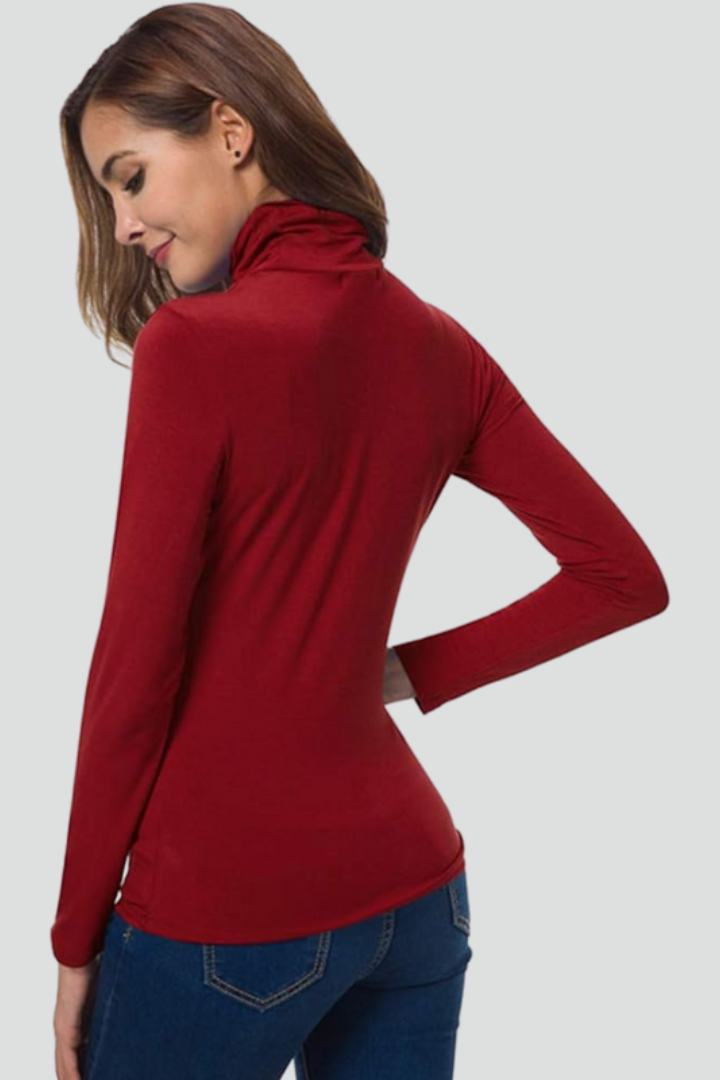 Women's long sleeve turtleneck, plain knit layering piece, perfect for winter fashion.