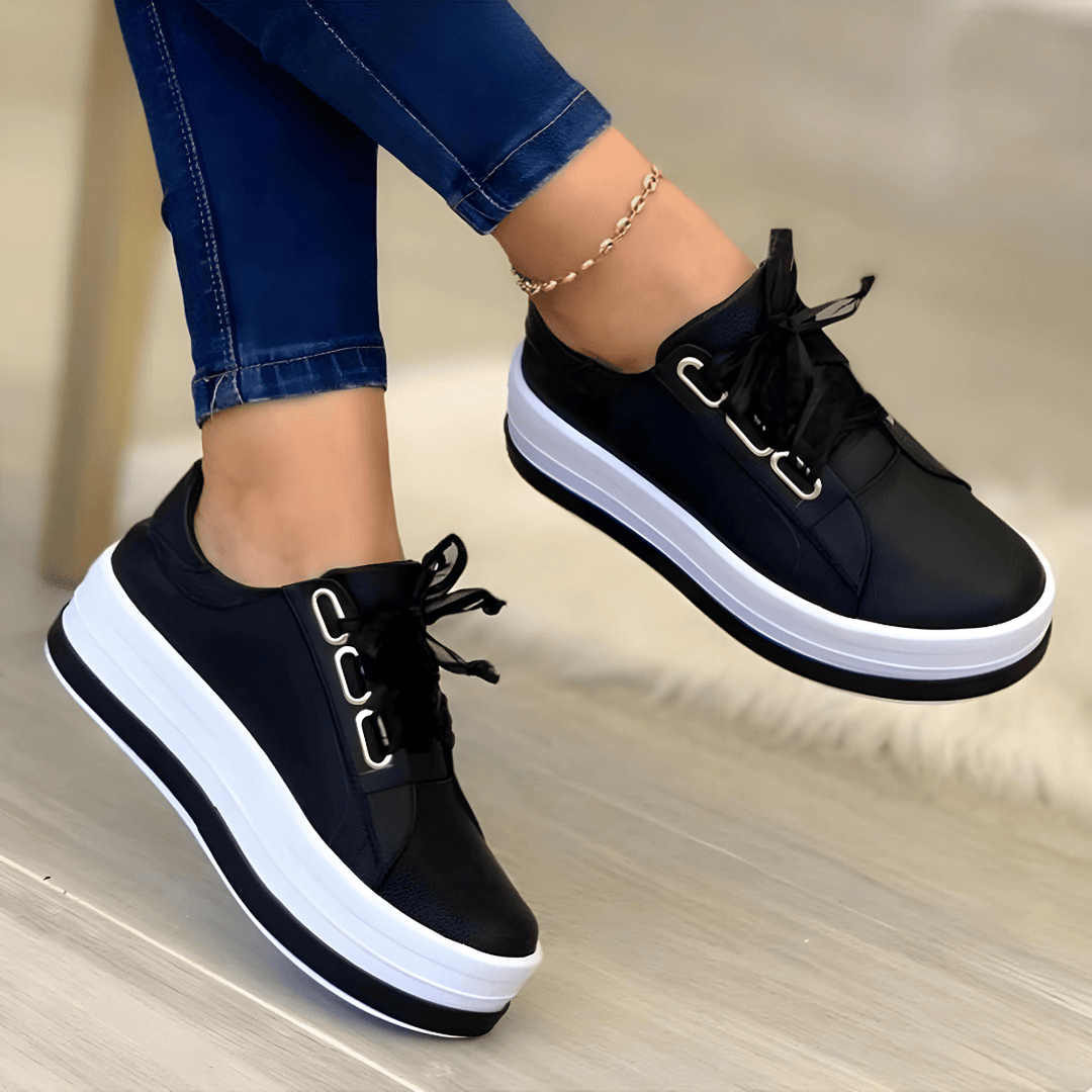 Women's platform casual sneakers with a comfortable elevated sole, perfect for trendy everyday wear.