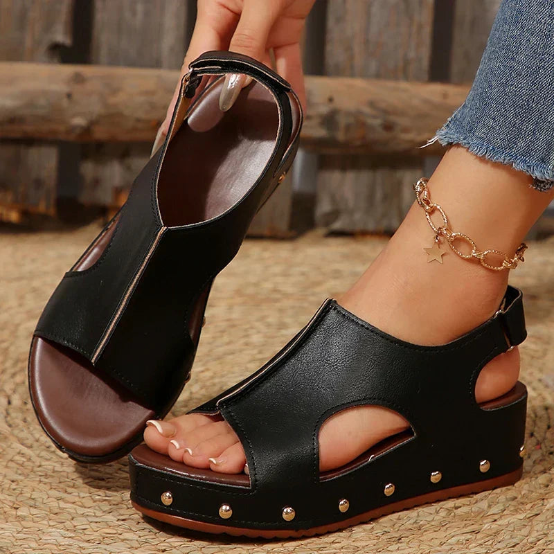 Women's platform sandals with thick cushioning for elevated comfort and chic casual summer style.