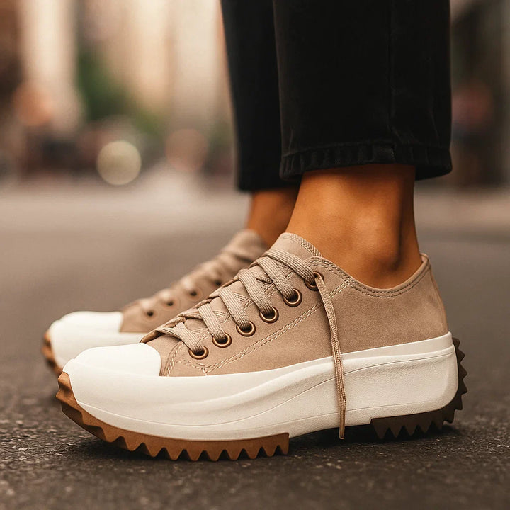 Stylish women's platform casual footwear: white lace-up sneakers, ideal for everyday wear with orthopedic support.