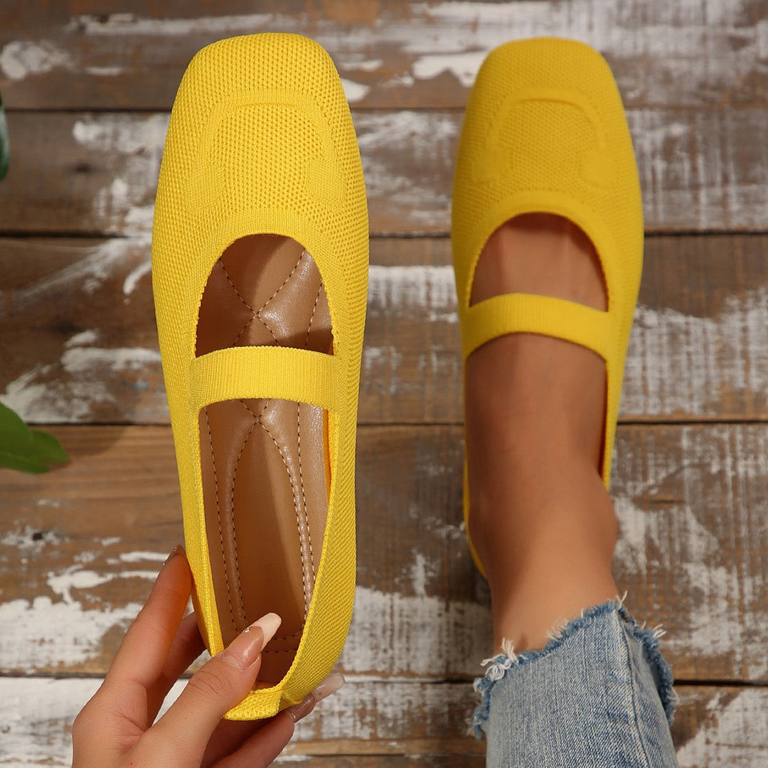 Unique women's slip-on Mary Jane ballet flats featuring a playful smiling face, perfect novelty casual shoes.