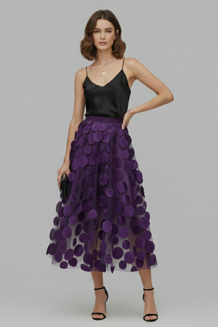 Soft fabric women's polka dot full midi skirt. Playful and elegant style, a must-have fashion piece.