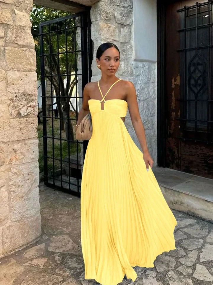 Elegant women's maxi dress with halter & cutout, ideal for wedding guests & formal events.