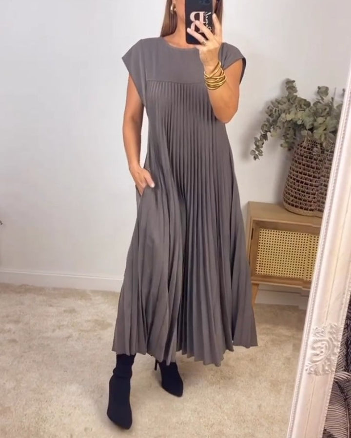 Summer women's pleated maxi dress, light & airy with extended cap sleeves & empire waist.