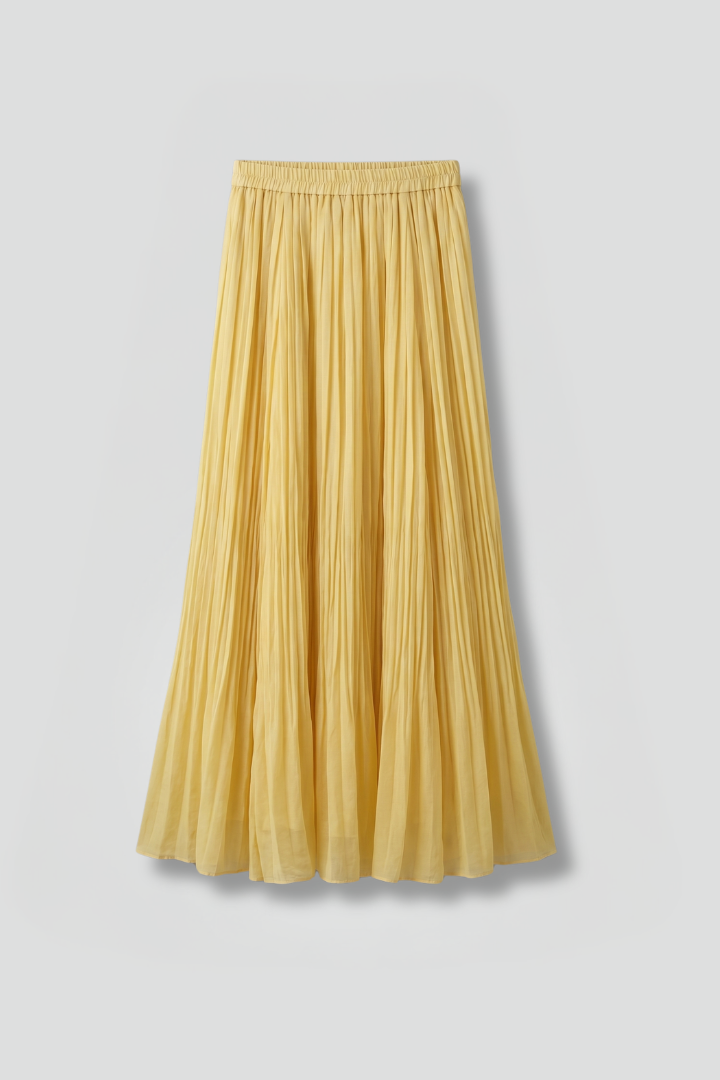 Women's pleated maxi skirt with comfortable elastic waistband, a flowy long skirt for elegant style.