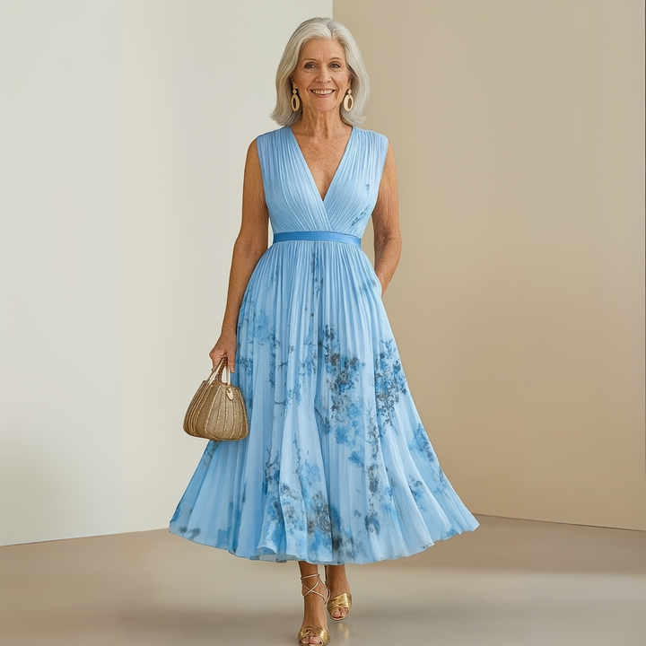 Elegant pleated sleeveless maxi party dress for women, stylish summer evening wear.