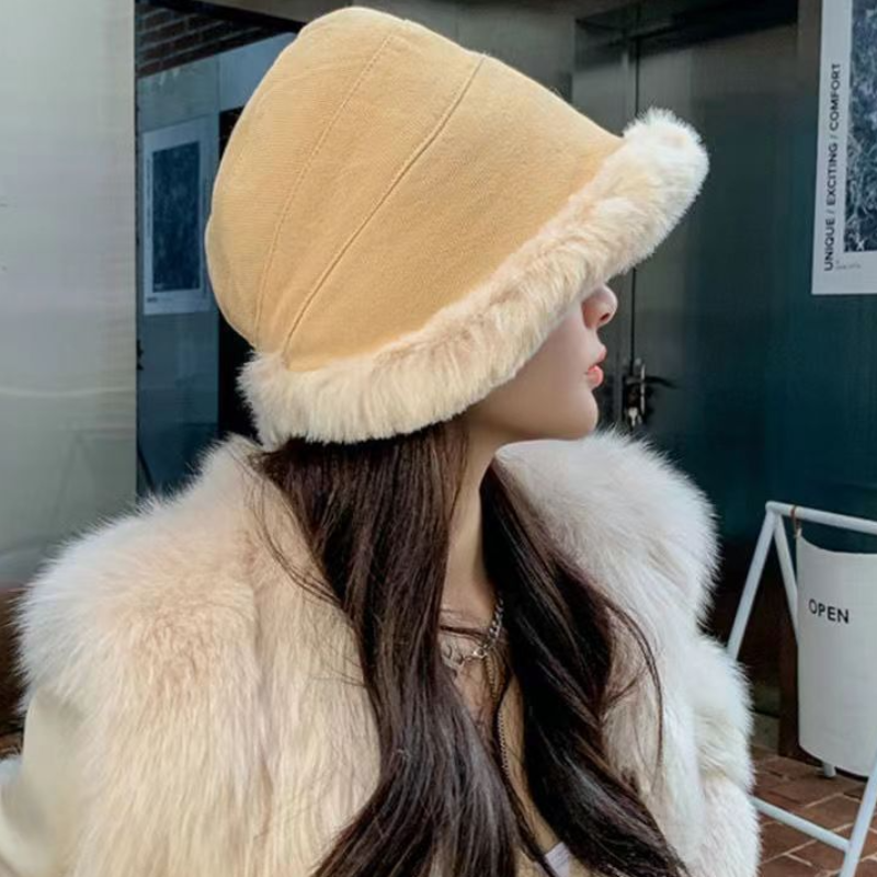 Close-up of a women's velvet bucket hat, showcasing plush texture and elegant winter style