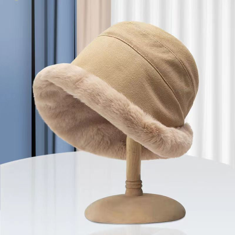 Side view of a warm velvet bucket hat for women, highlighting its cozy, fashionable design