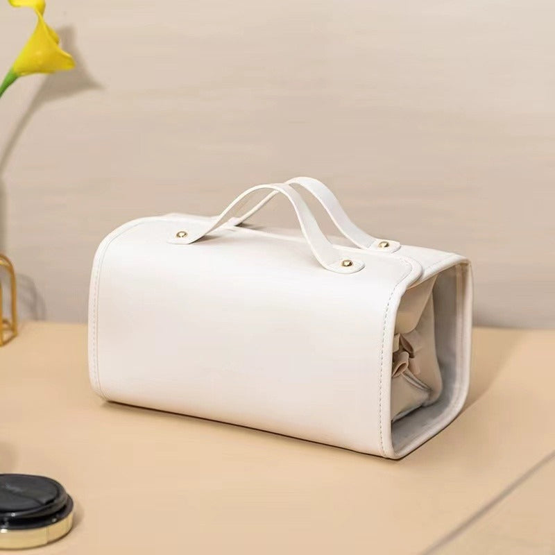 Stylish black PU leather 4-in-1 cosmetic bag, perfect for travel and makeup storage, waterproof