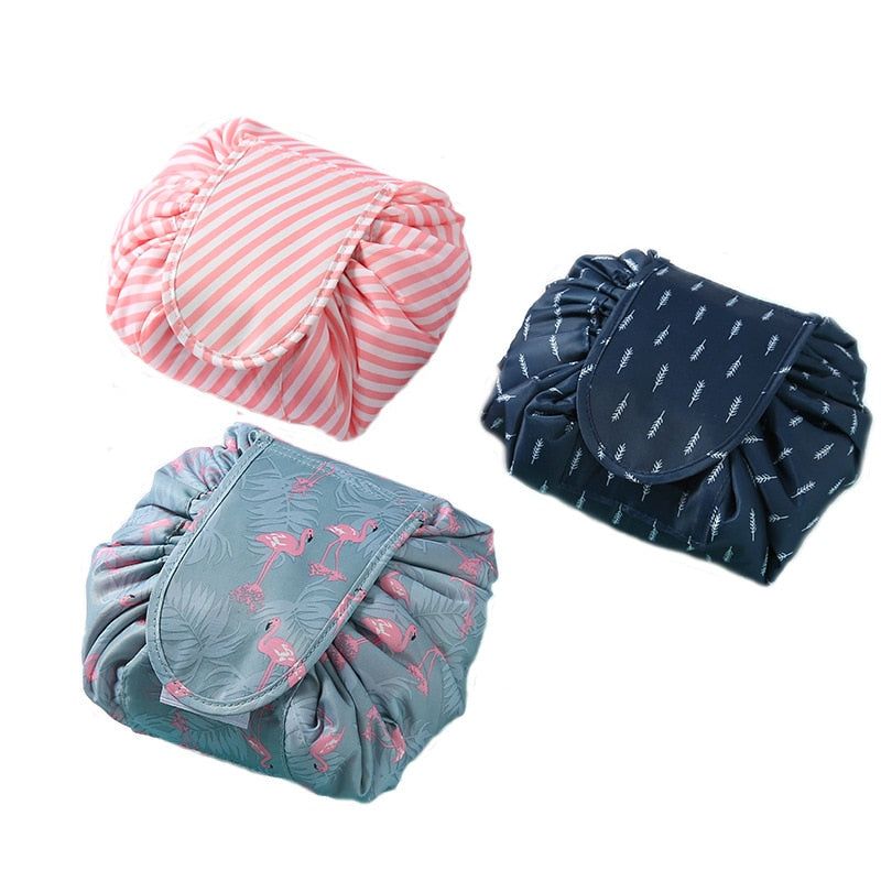 Women's portable drawstring cosmetic bag, open showing makeup storage, ideal travel organizer.