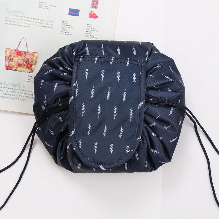 Drawstring toiletry bag on bathroom counter, a practical women's travel accessory for daily use.