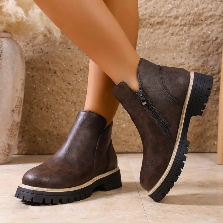 Comfortable women's ankle boots with a robust lug sole, made from high-quality premium leather.