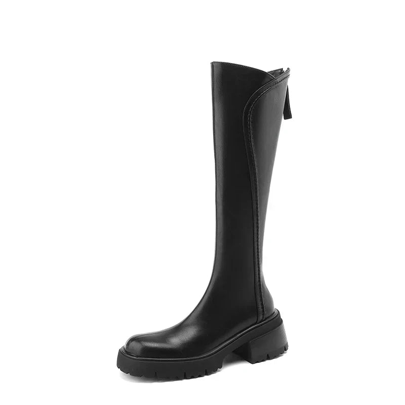Elegant women's premium leather boots with orthopedic features, suitable for daily wear.