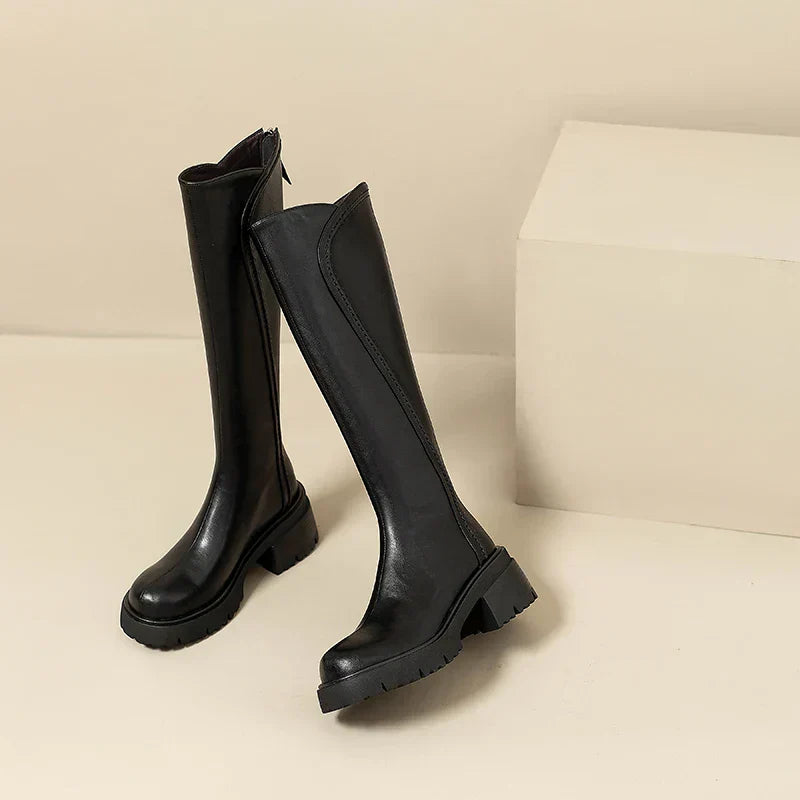 Side view of women's orthopedic knee-high boots, showcasing the practical and stylish design.