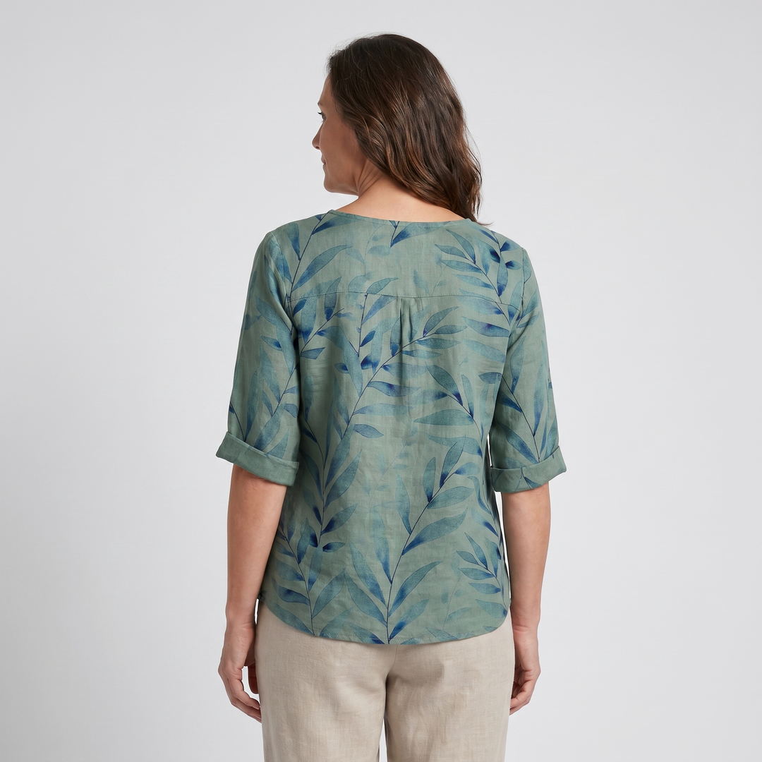 Blue printed asymmetric top for women, stylish and comfortable, perfect for daily fashion.