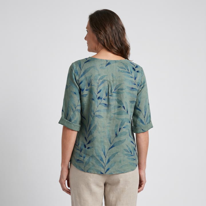 Blue printed asymmetric top for women, stylish and comfortable, perfect for daily fashion.