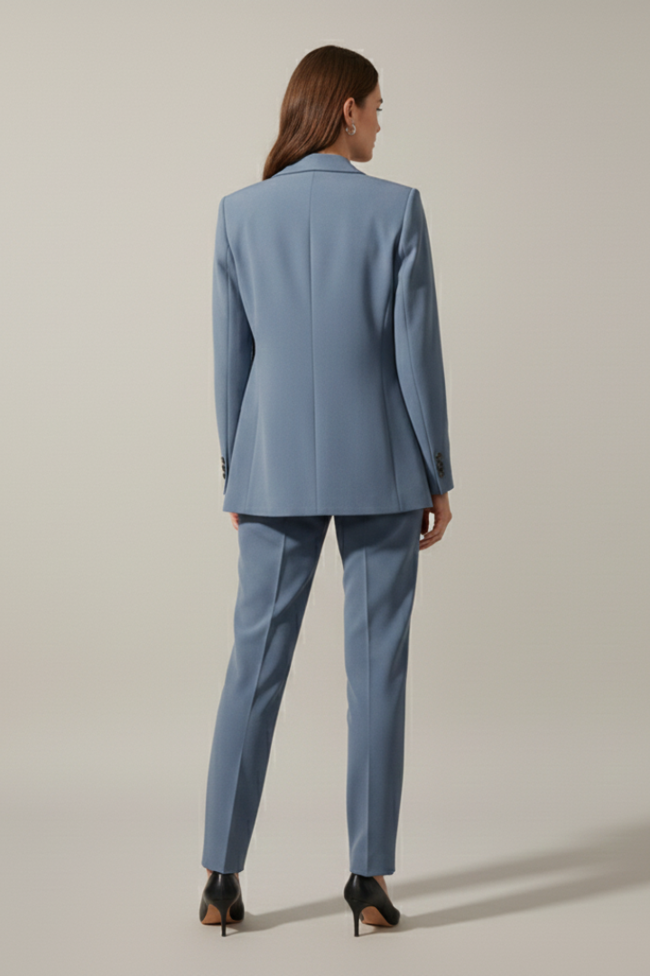 Stylish women's blazer and straight leg trousers set, ideal for professional wear and office outfit.